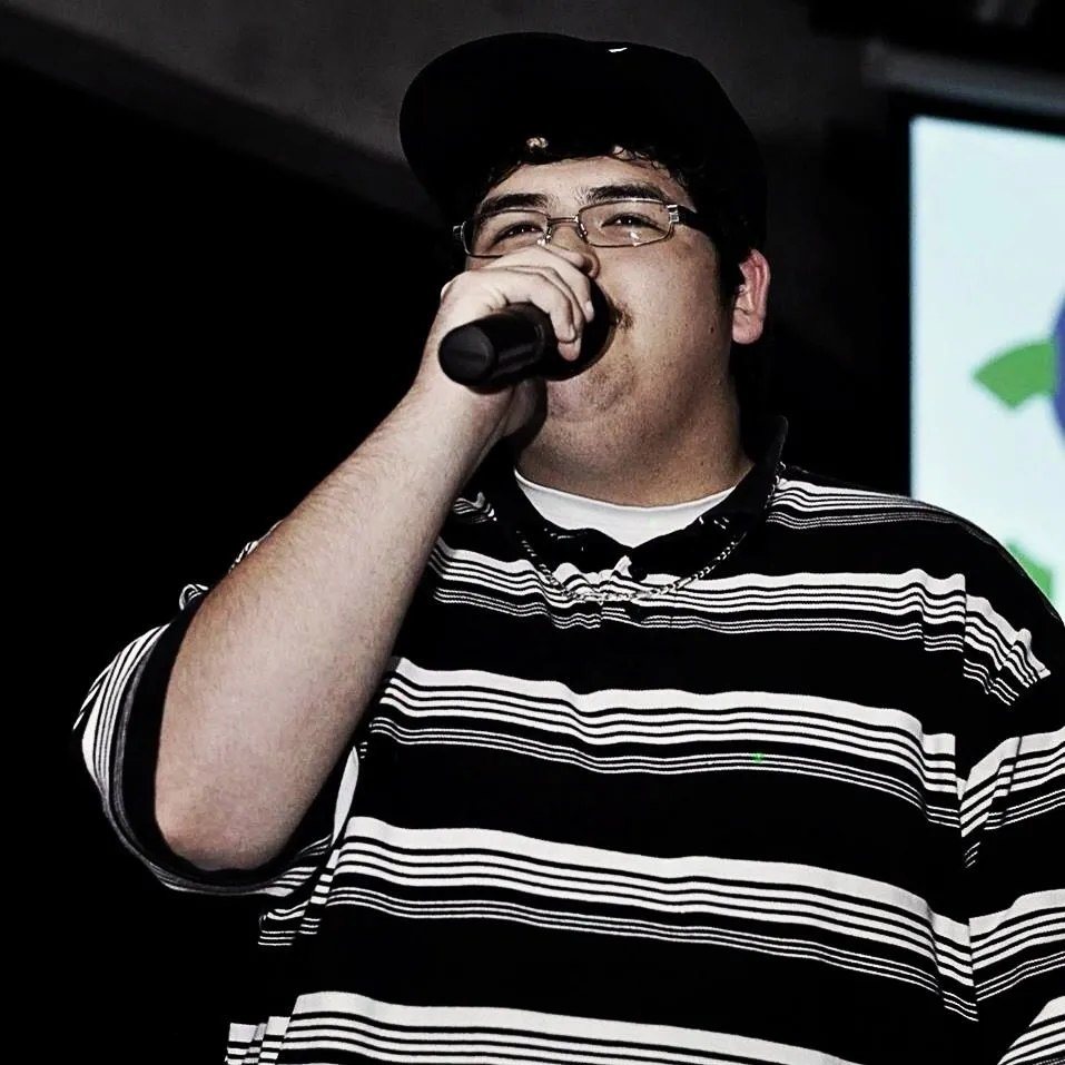 Jonathan rapping at a Young Rebels event