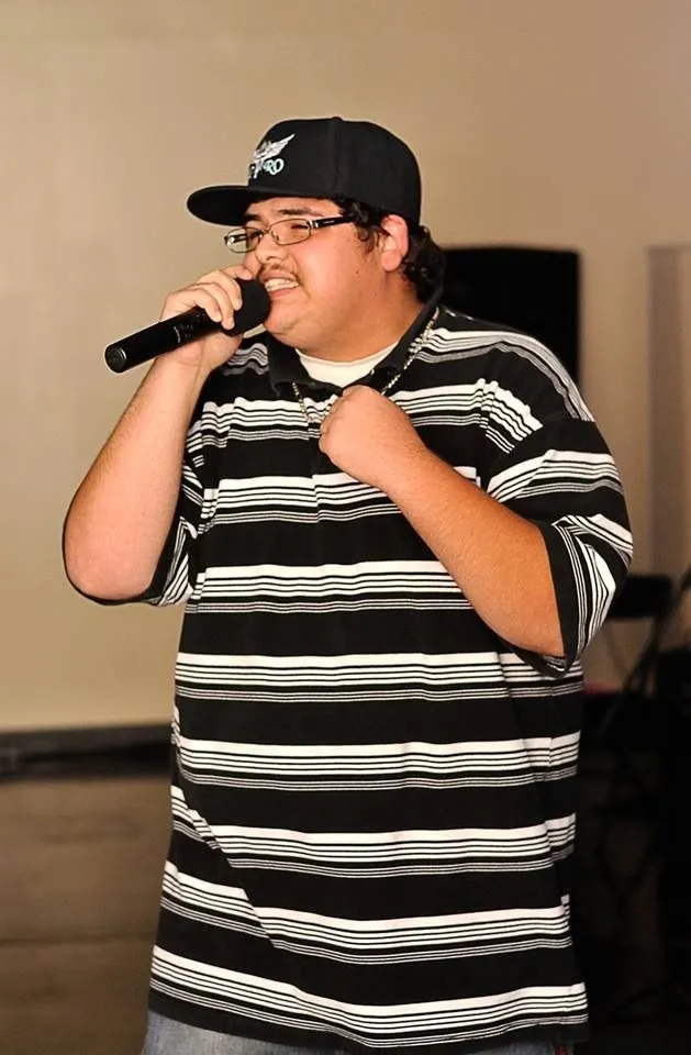 Jonathan rapping at a Young Rebels event