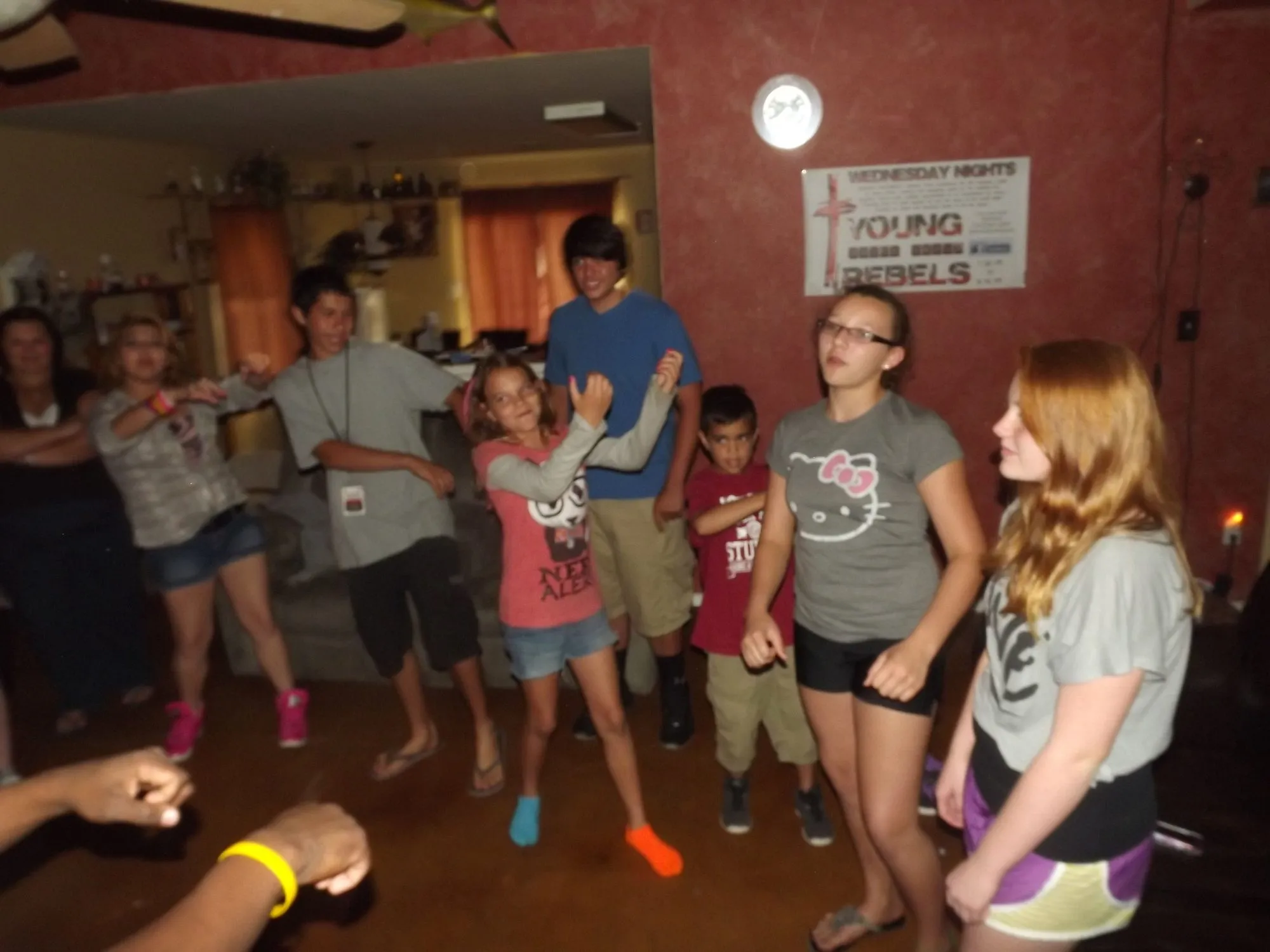 Young Rebels hanging out in the living room